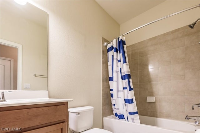 full bathroom featuring vanity, toilet, and shower / tub combo with curtain