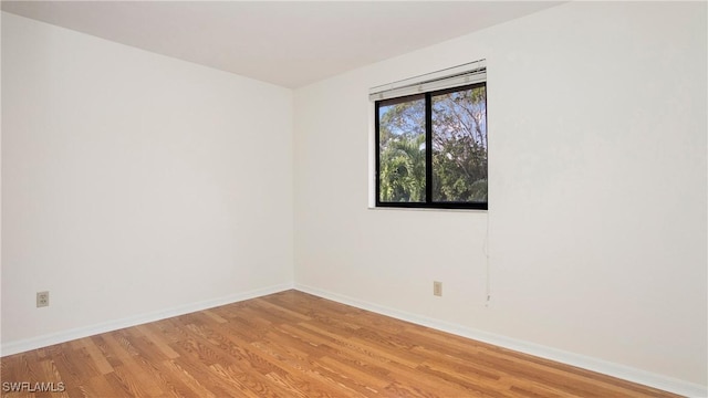 unfurnished room featuring light hardwood / wood-style flooring