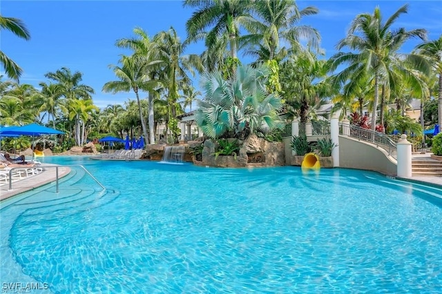 view of pool with pool water feature