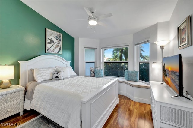 bedroom with ceiling fan and hardwood / wood-style floors