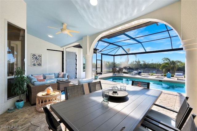 view of patio / terrace with ceiling fan, an outdoor hangout area, and a lanai