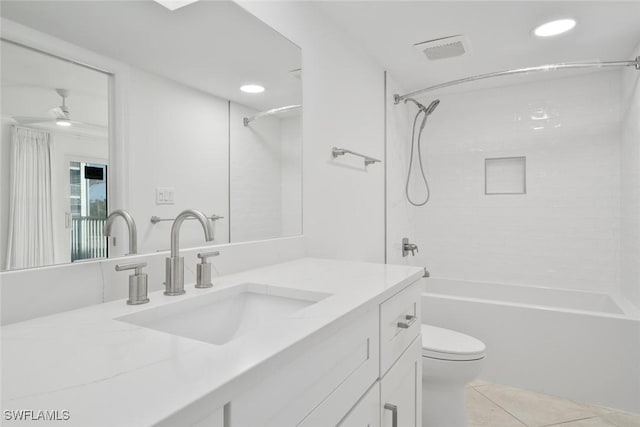 full bathroom with tile patterned floors, vanity, toilet, and shower / bath combination