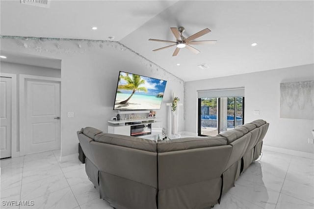 living room featuring lofted ceiling and ceiling fan