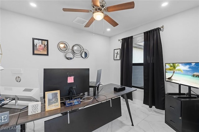 office area with ceiling fan