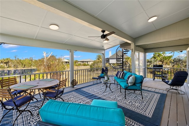 deck featuring ceiling fan, area for grilling, and an outdoor living space