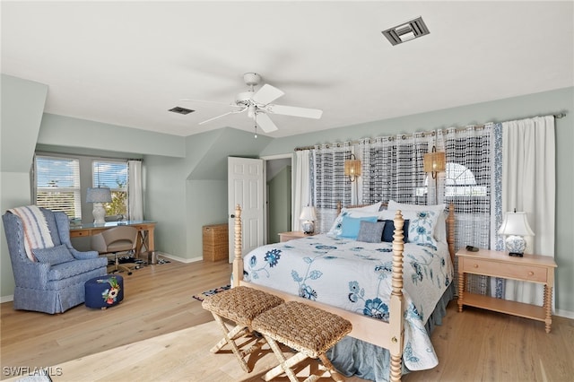 bedroom featuring ceiling fan and hardwood / wood-style floors