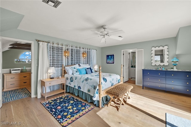 bedroom with ceiling fan and light wood-type flooring