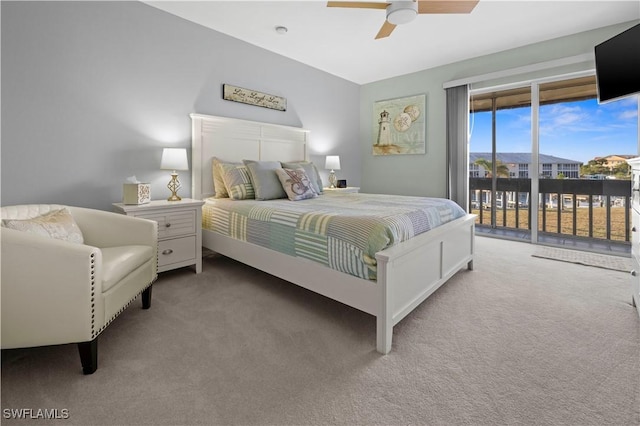 carpeted bedroom featuring access to exterior and ceiling fan