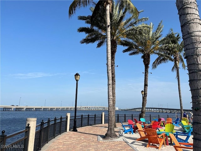 view of home's community with a water view