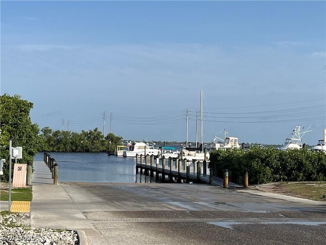 dock area featuring a water view