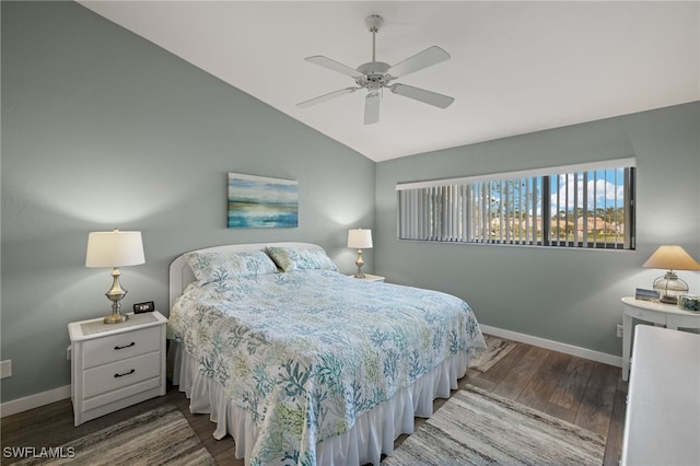 bedroom featuring ceiling fan, wood-type flooring, and vaulted ceiling