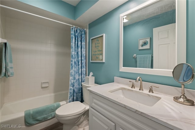 full bathroom featuring vanity, toilet, and shower / tub combo with curtain