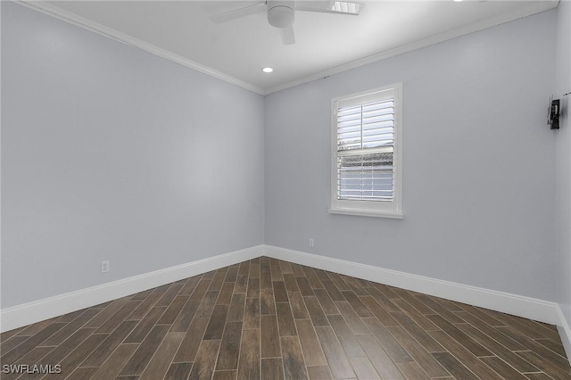 spare room featuring dark hardwood / wood-style floors, ceiling fan, and ornamental molding