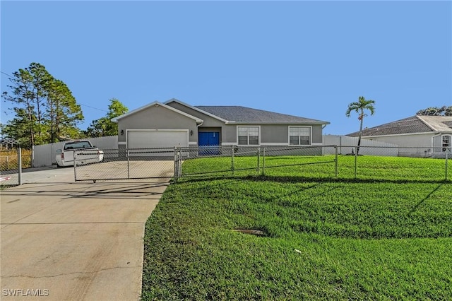 view of front of property featuring a garage and a front yard