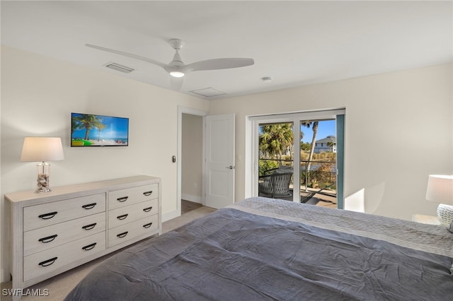 bedroom featuring light colored carpet, ceiling fan, and access to exterior