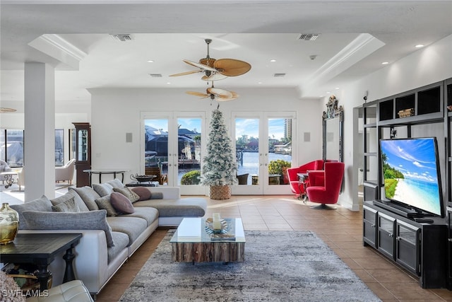 living room featuring french doors, tile patterned flooring, visible vents, and recessed lighting