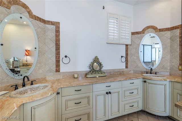 full bathroom featuring tile patterned flooring, tile walls, and vanity