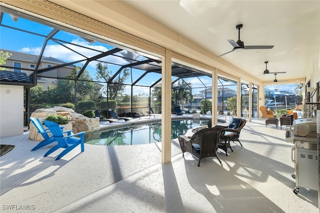 outdoor pool featuring a lanai and a patio