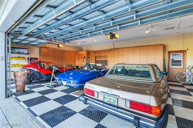 garage featuring a garage door opener