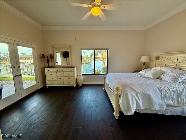 unfurnished bedroom with access to exterior, dark wood finished floors, french doors, and crown molding