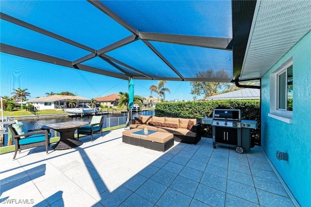 view of patio / terrace with an outdoor hangout area and a water view