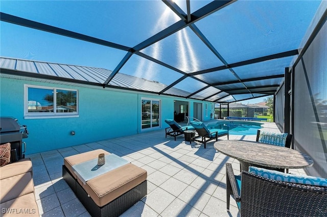 view of patio with a lanai