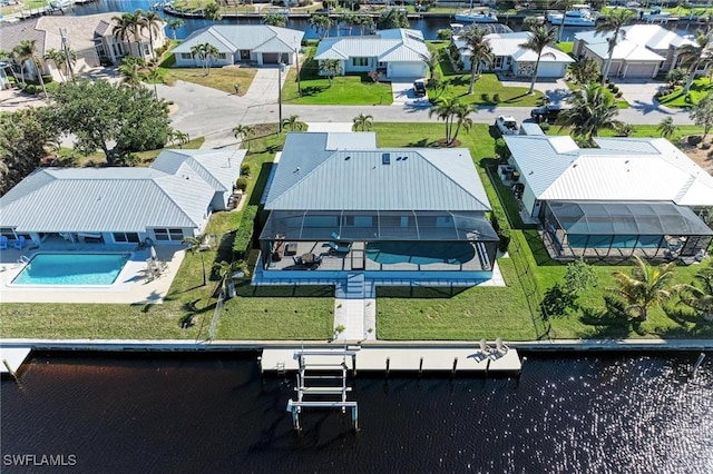 drone / aerial view with a water view