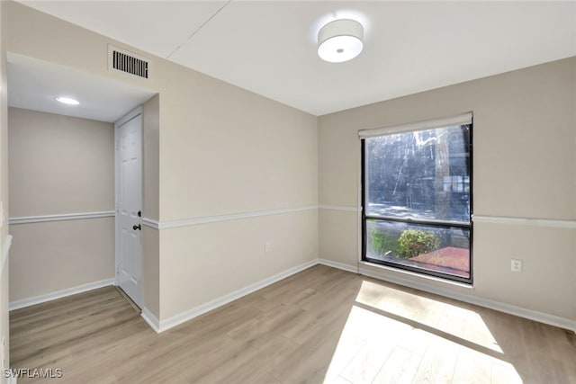 empty room with light wood-type flooring