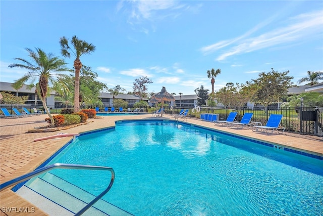 view of swimming pool with a patio area