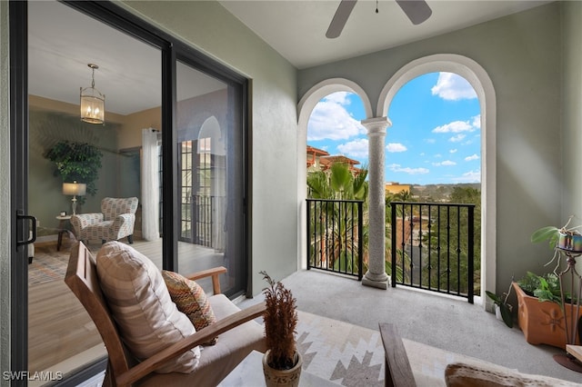 balcony featuring ceiling fan