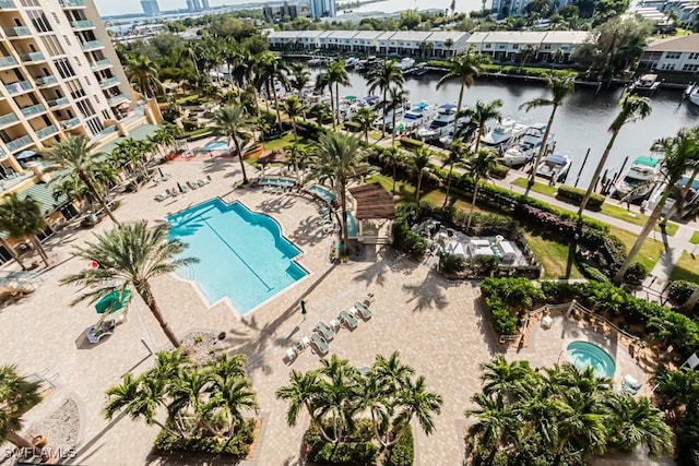 birds eye view of property featuring a water view