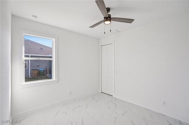 unfurnished room with ceiling fan