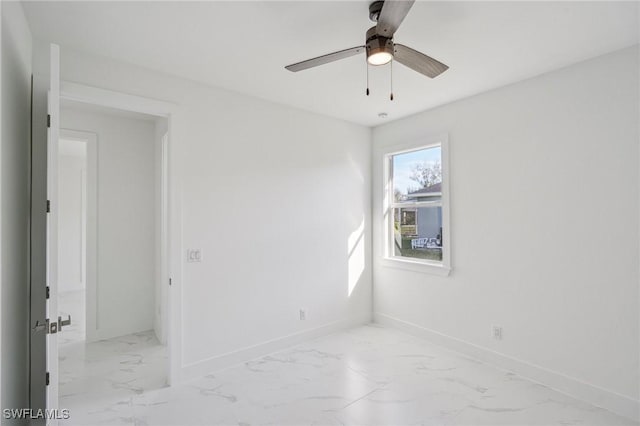 spare room featuring ceiling fan