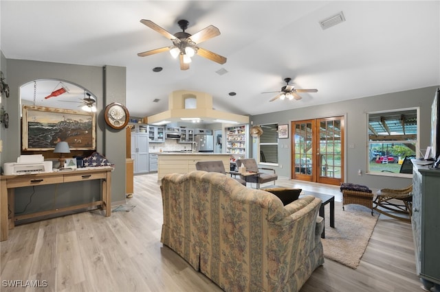 2915 Ortona Locks Rd, Moore Haven, FL 33471 - living room with a ceiling fan, lofted ceiling, and light wood-style floors