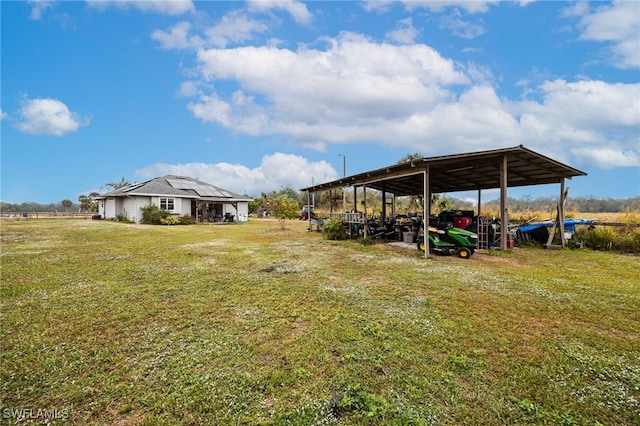 2915 Ortona Locks Rd, Moore Haven, FL 33471 - view of grassy yard featuring a carport