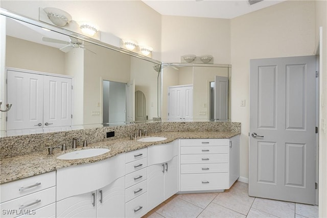 bathroom with vanity, tile patterned floors, and ceiling fan