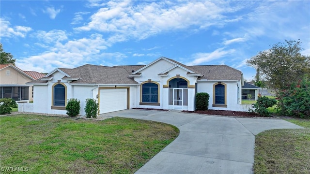 single story home with a front yard and a garage