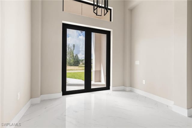 foyer featuring french doors