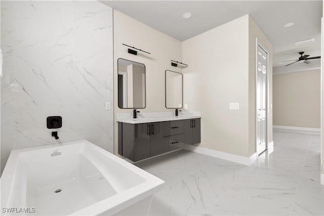 bathroom featuring a tub, ceiling fan, and vanity