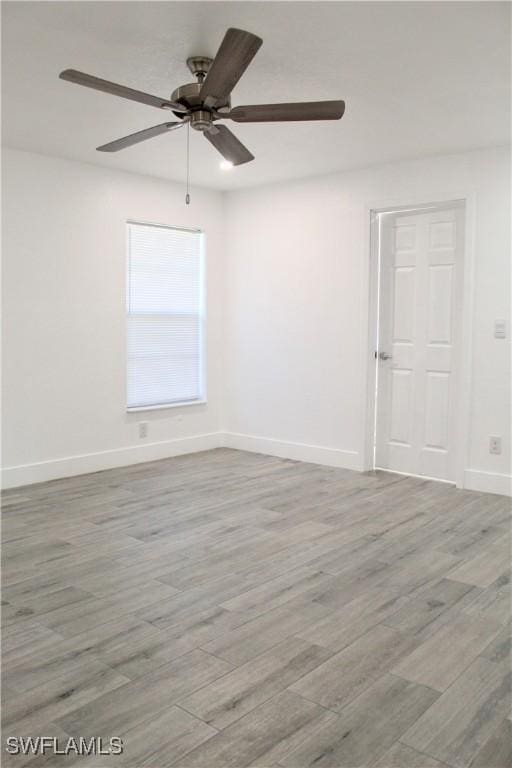 unfurnished room with ceiling fan and light hardwood / wood-style floors