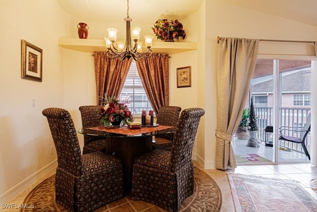 dining area with a chandelier