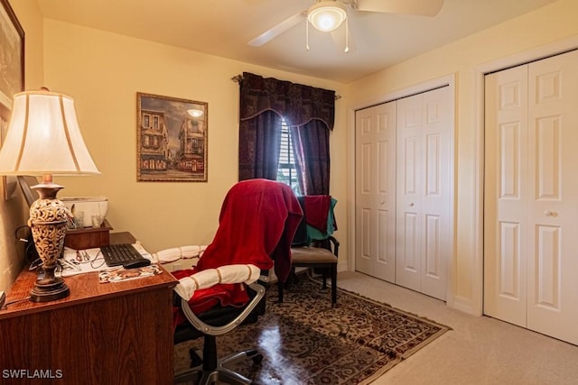 home office with carpet and ceiling fan