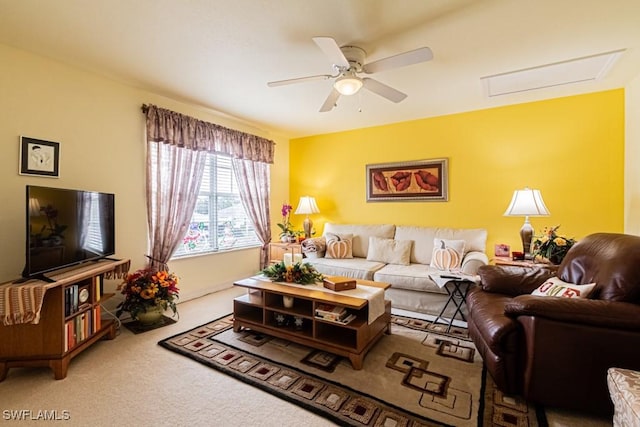 living room featuring ceiling fan and carpet floors