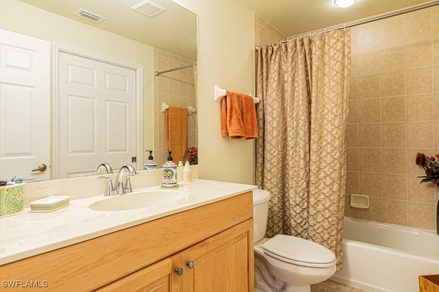 full bathroom featuring vanity, toilet, and shower / bath combo with shower curtain