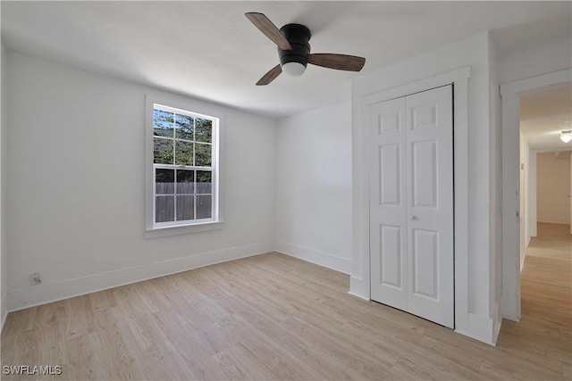 empty room featuring light hardwood / wood-style floors and ceiling fan