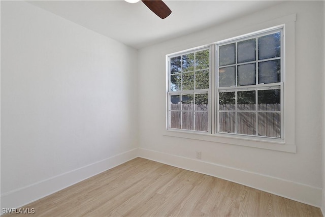 unfurnished room featuring ceiling fan and light hardwood / wood-style flooring