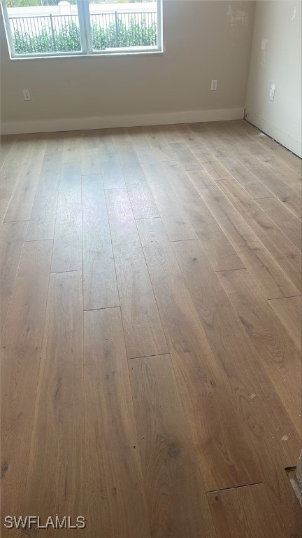 empty room featuring light hardwood / wood-style flooring