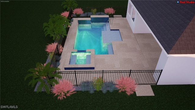 view of pool featuring a patio, fence, and a pool with connected hot tub