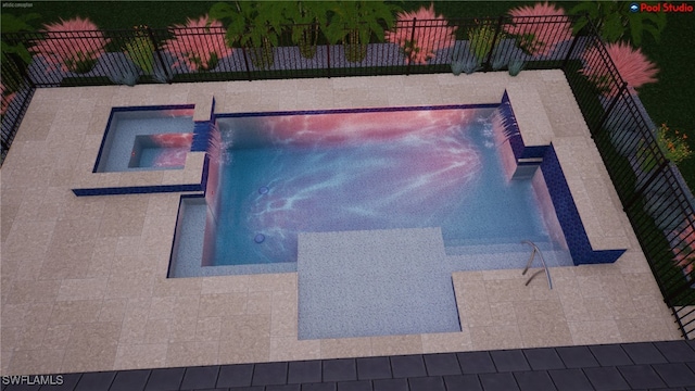 view of pool with an in ground hot tub and fence