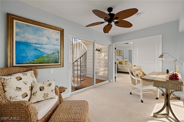 carpeted office with ceiling fan